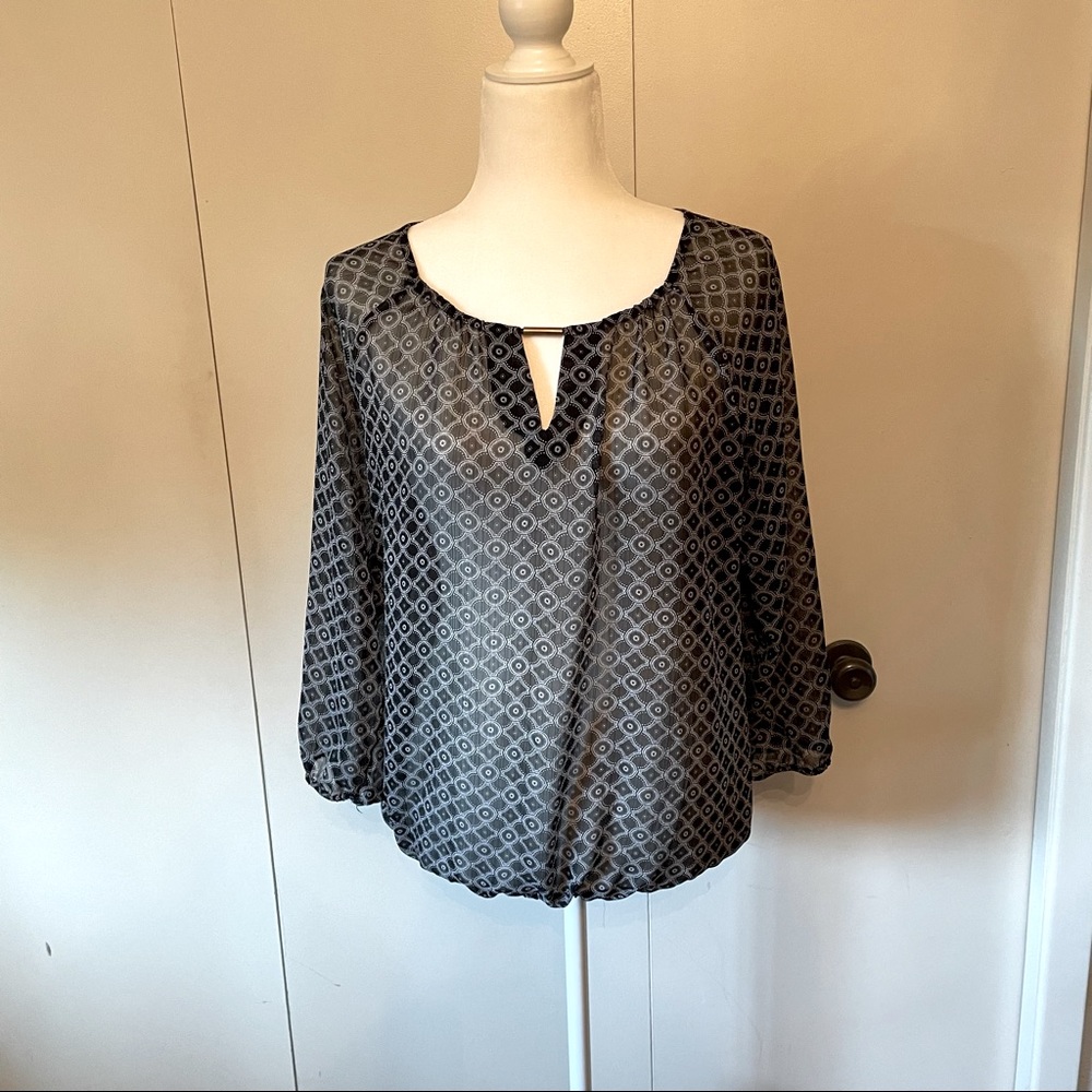 Black with slight white detail blouse